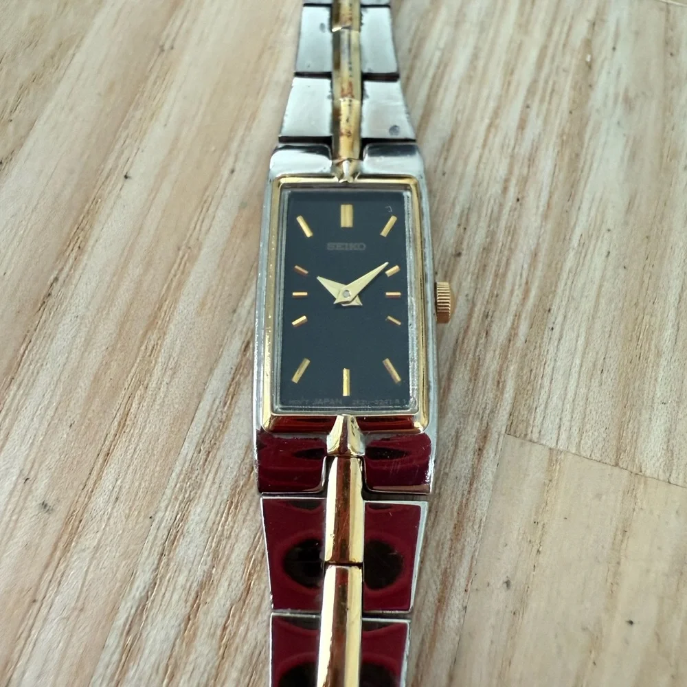 Seiko ladies two tone rectangular black dial dress watch NEW BATTERY